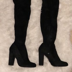 Thigh high black suede boots